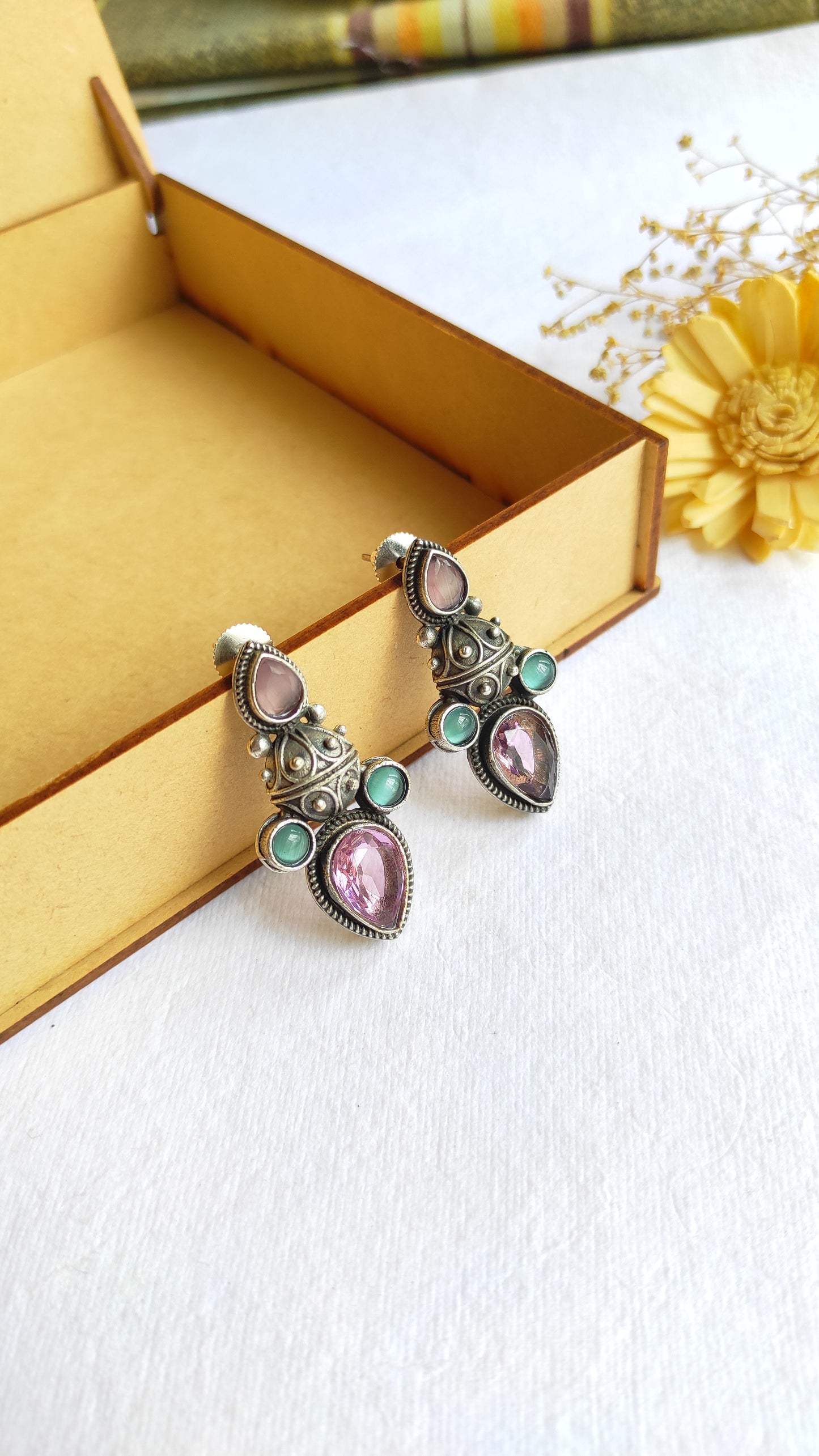 Priyal silver lookalike studs earrings