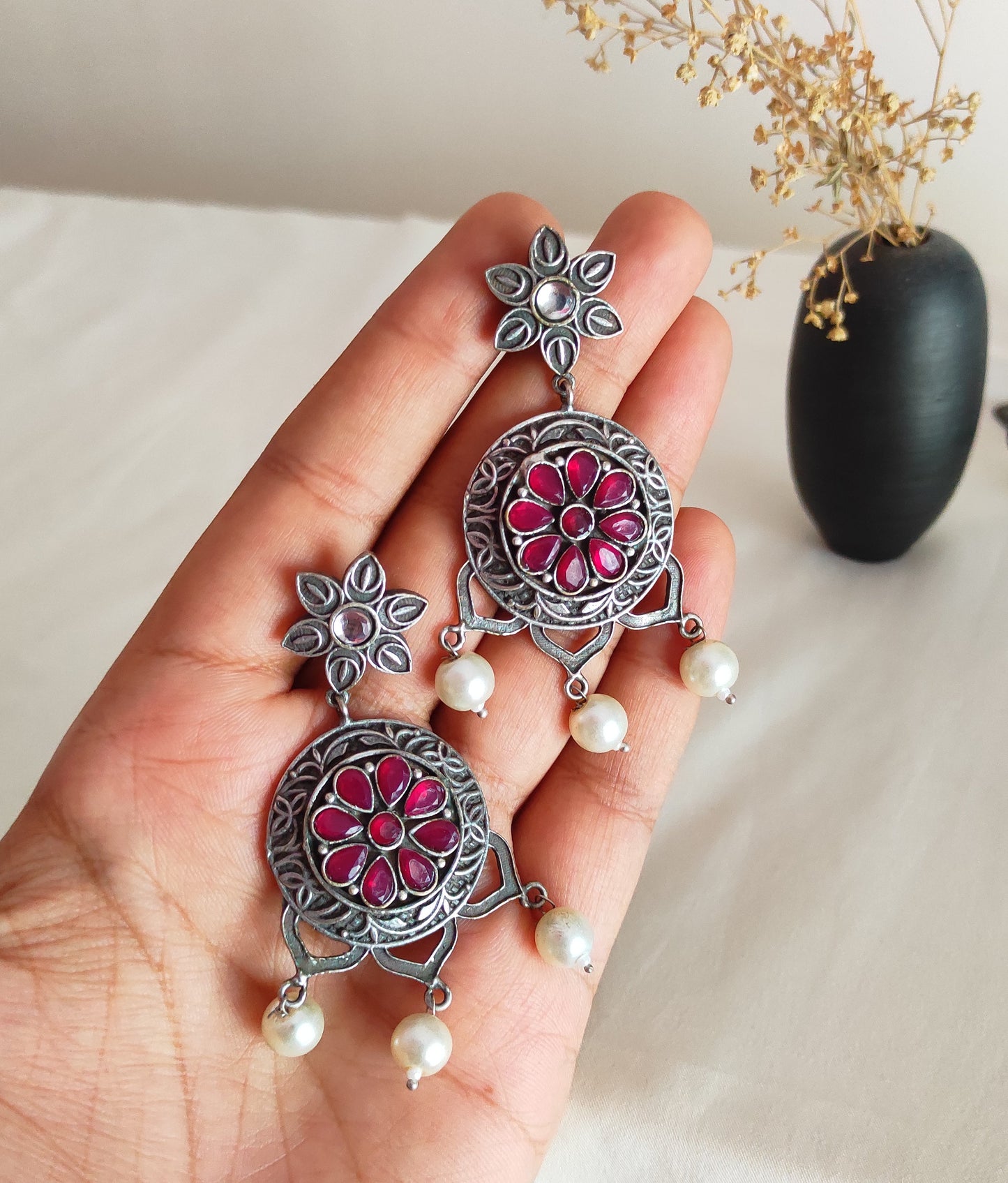 Netra silver lookalike earrings
