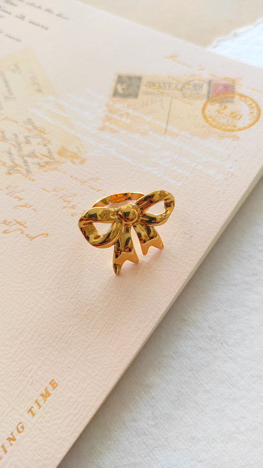Golden bow ring