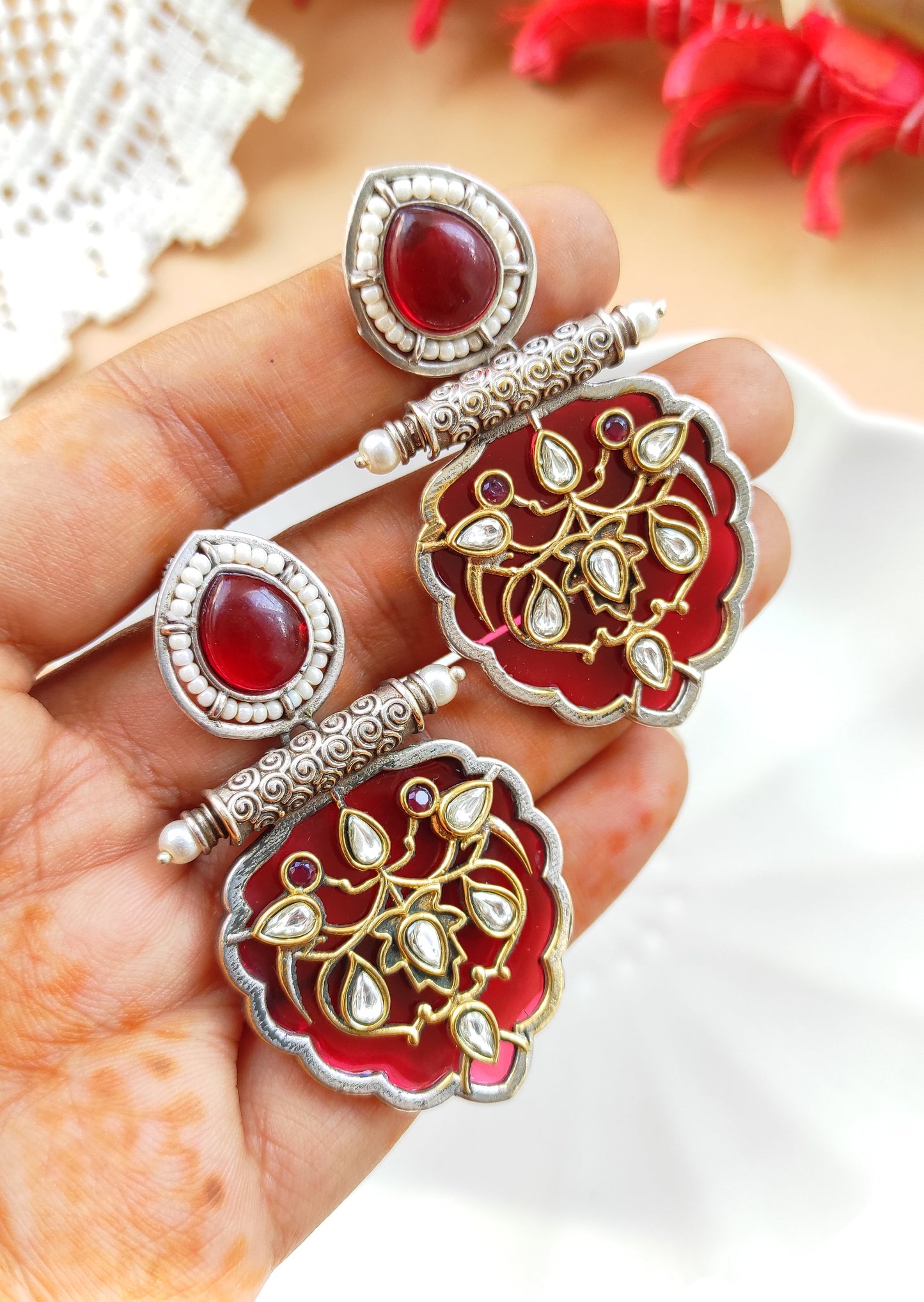 Jhilmil dual tone earrings with intricate carving and kundan