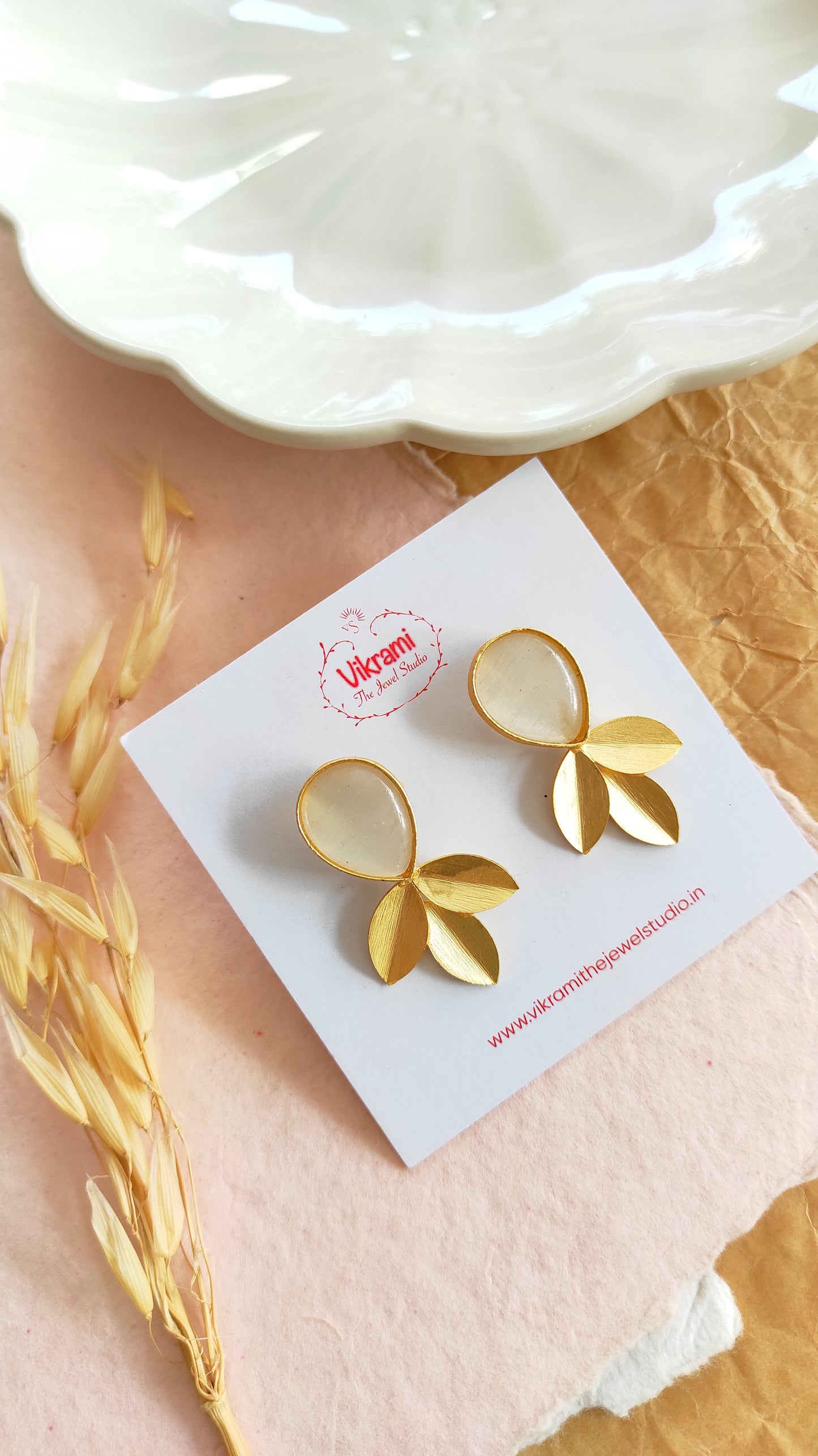 Golden contemporary studs earrings