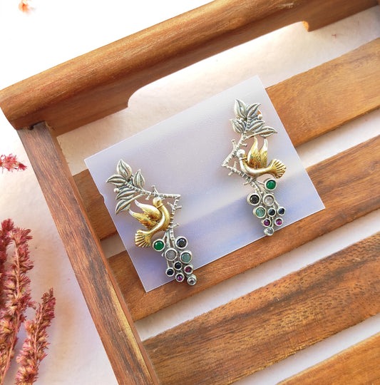 Parinda dualtone studs earrings