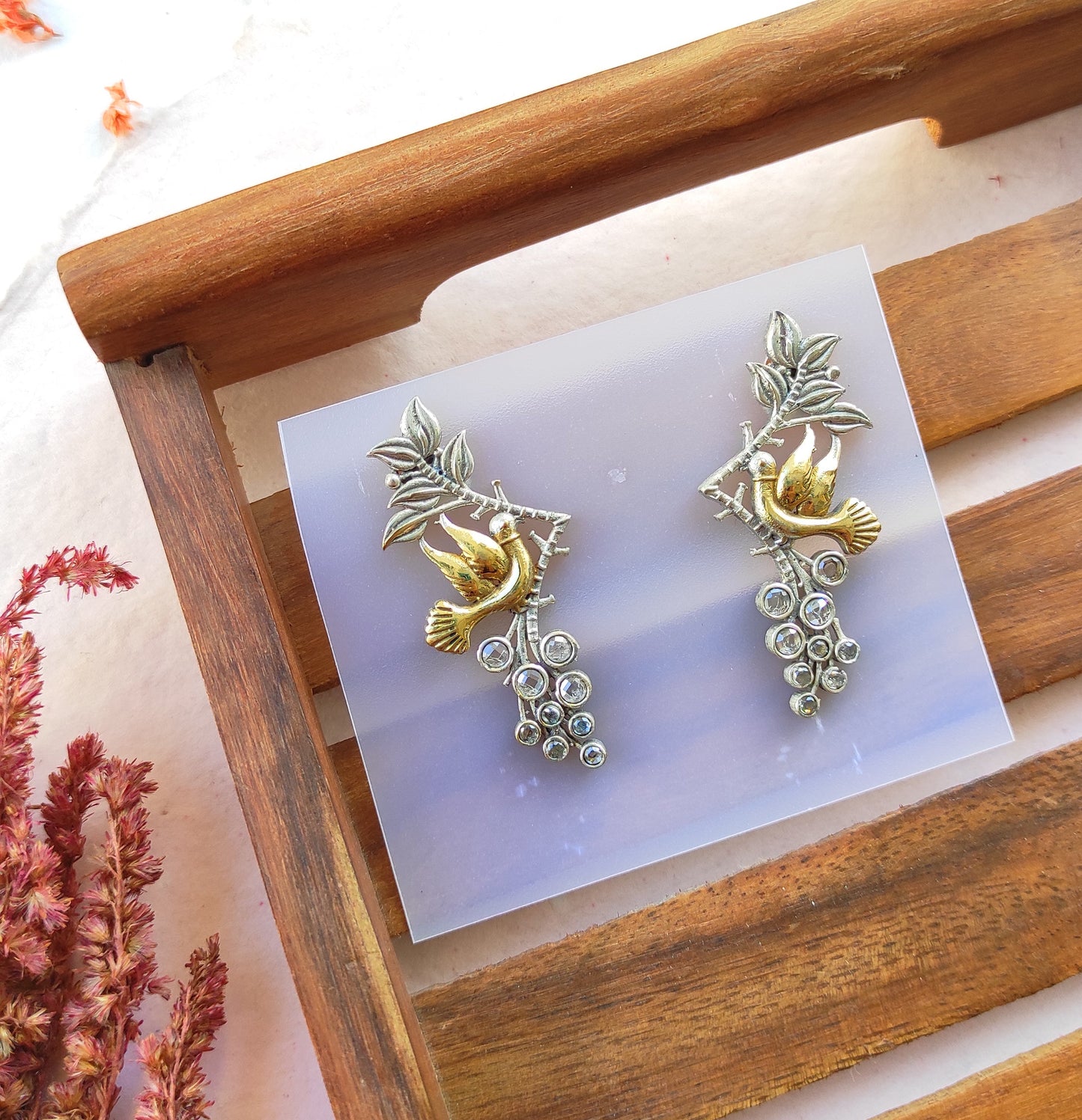 Parinda dualtone studs earrings