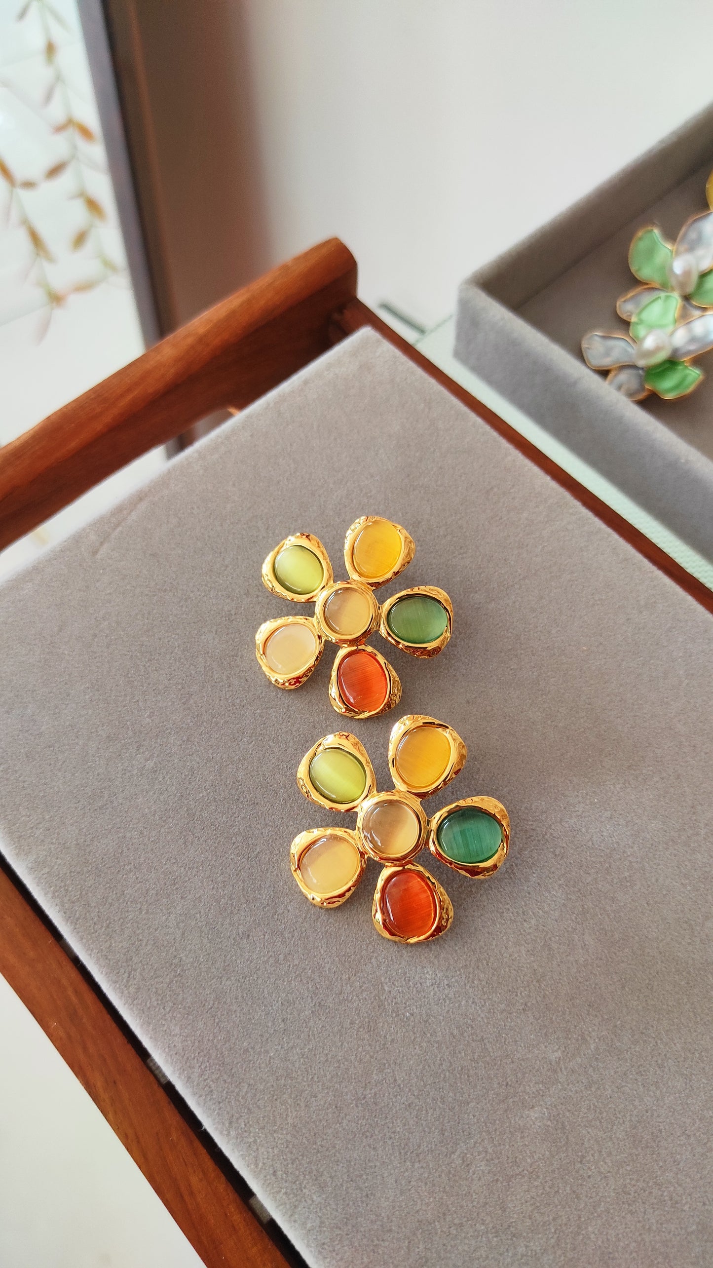 Golden multi color stones stud earrings