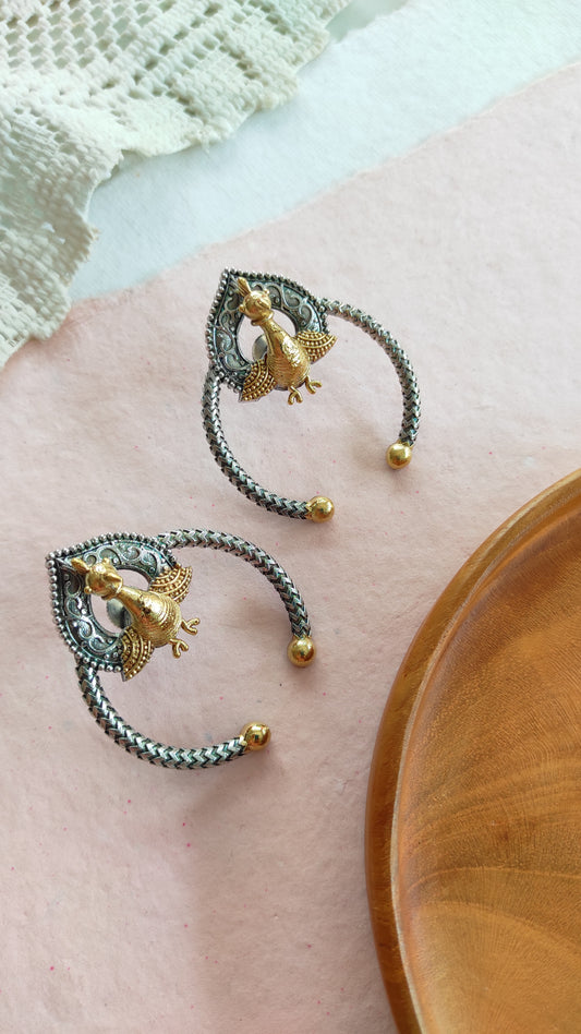 Peacock dual tone stud earrings