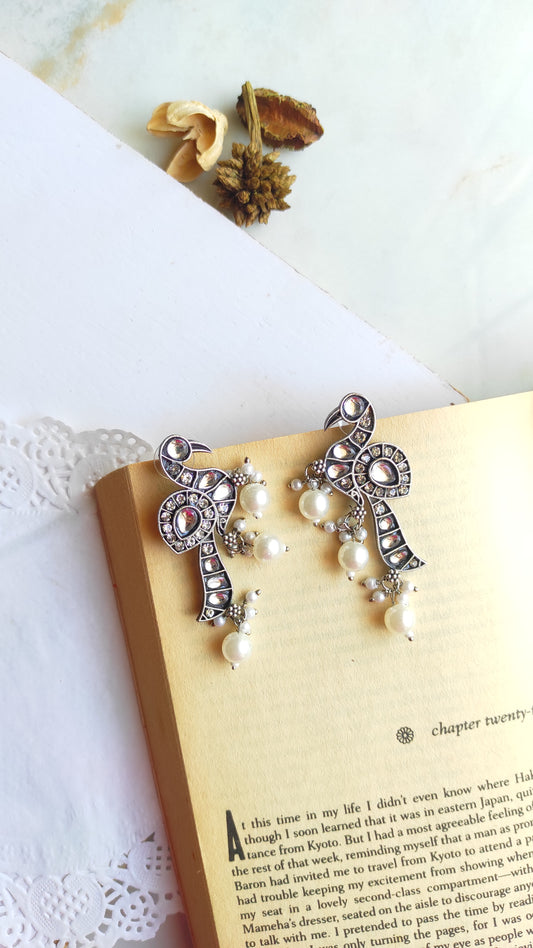 Stone studded peacock studs earrings