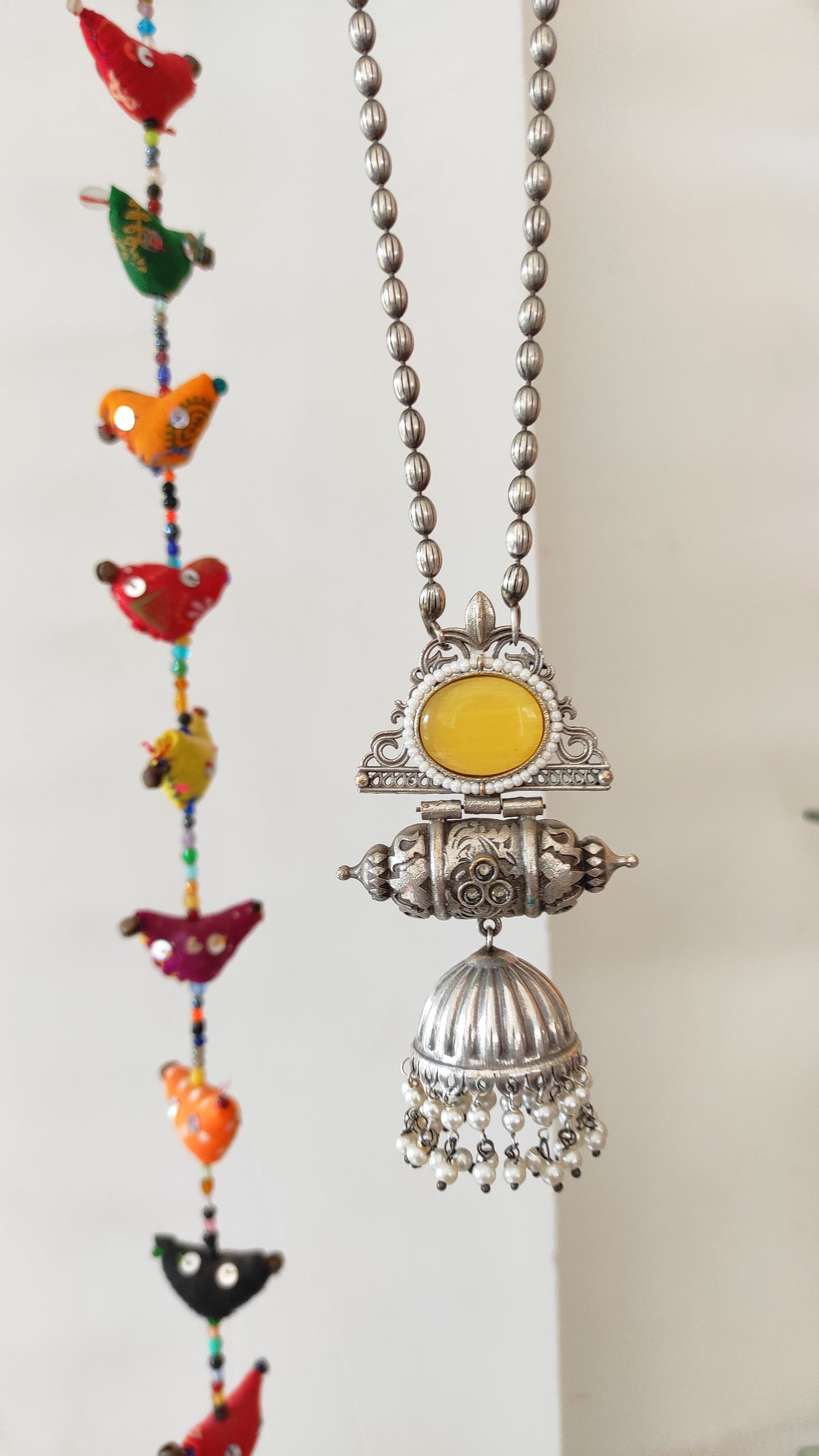 Prerna long chain with statement jhumka pendant