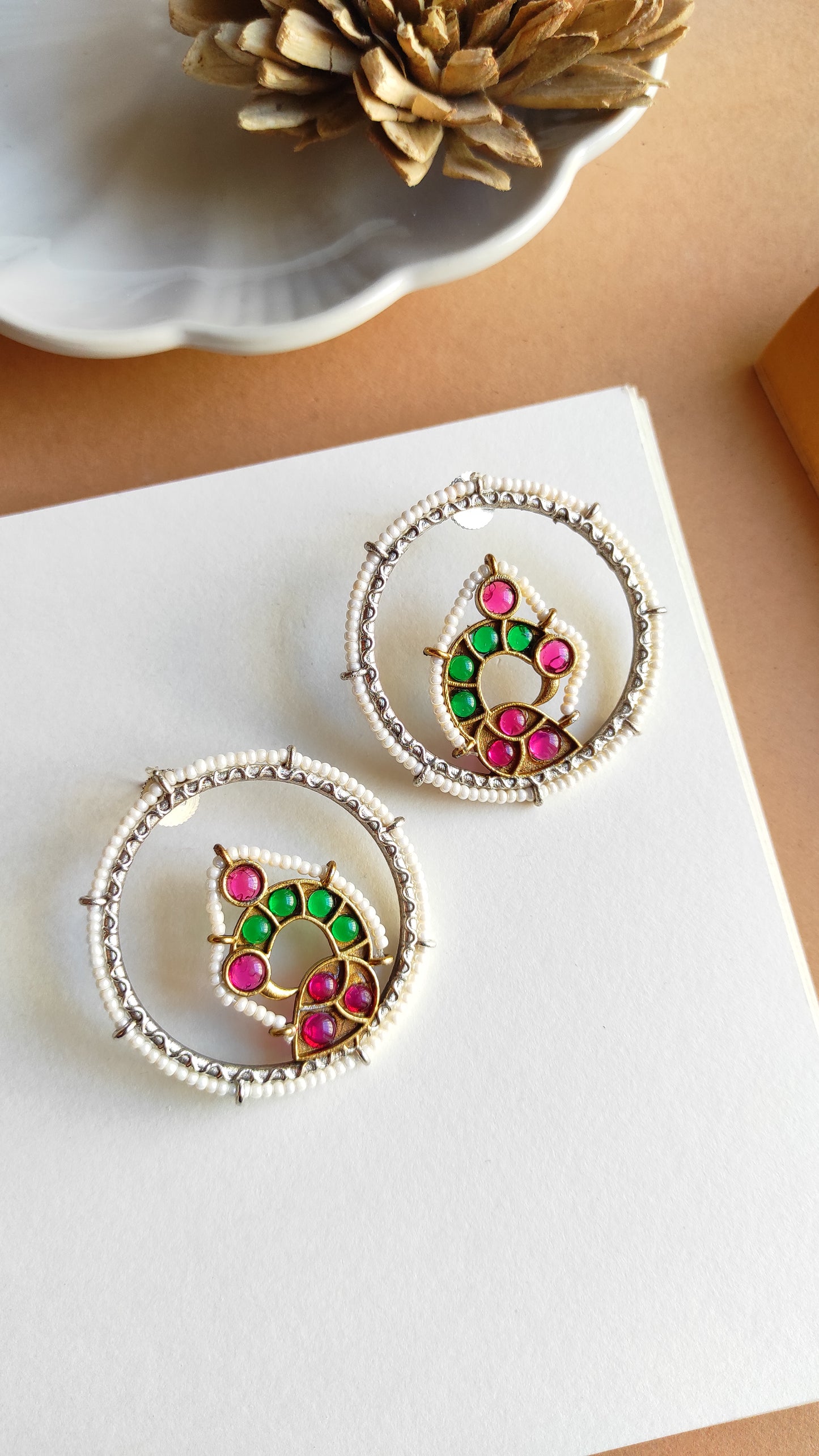 Beaded peacock studs