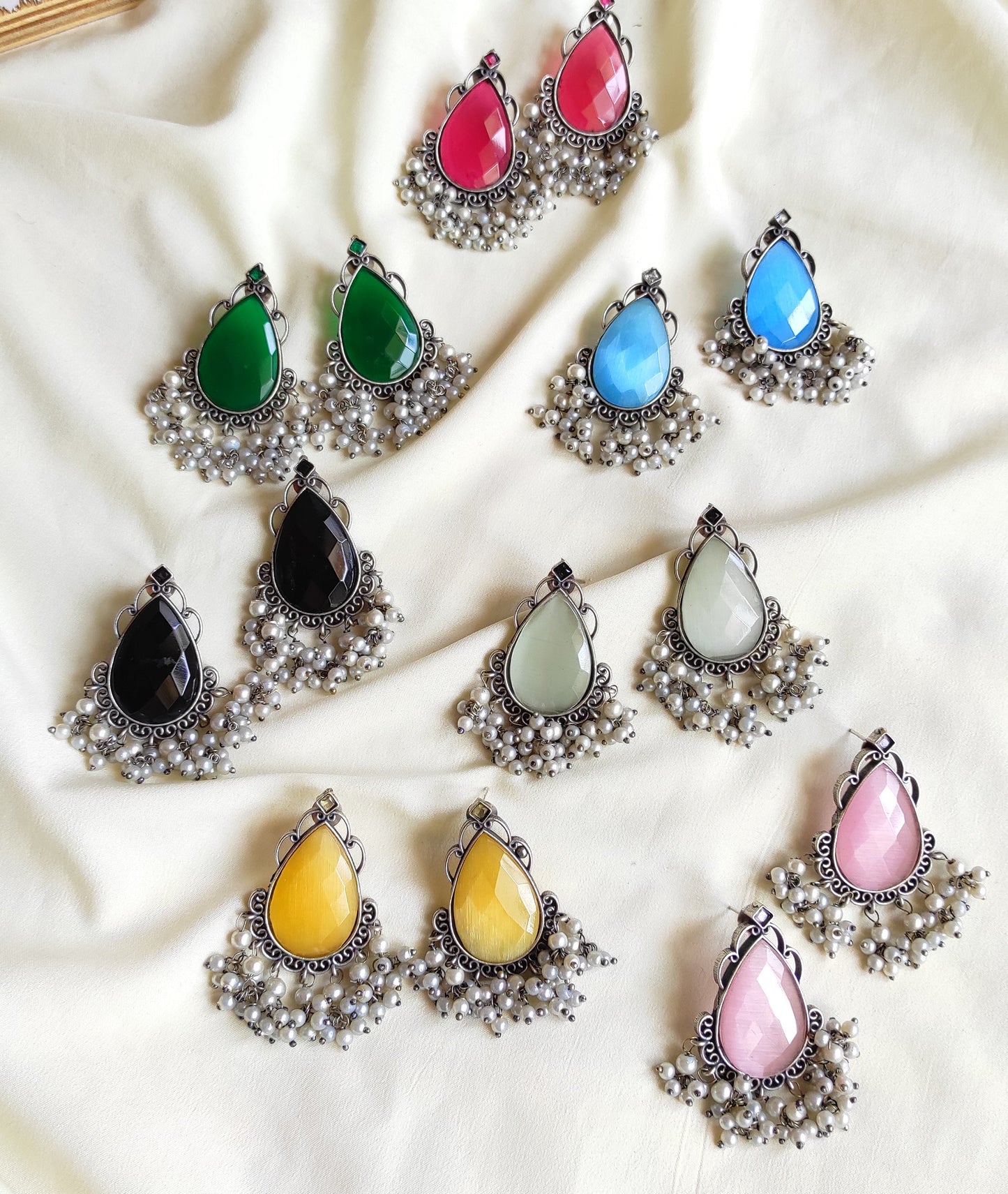 Tear drop studs with color stones and pearl hangings