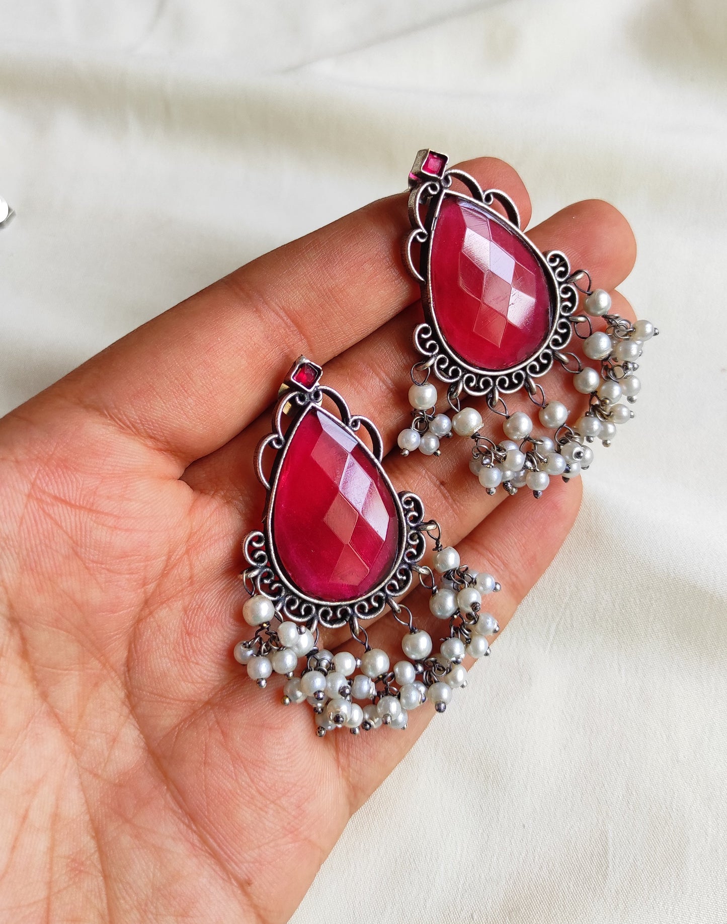 Tear drop studs with color stones and pearl hangings