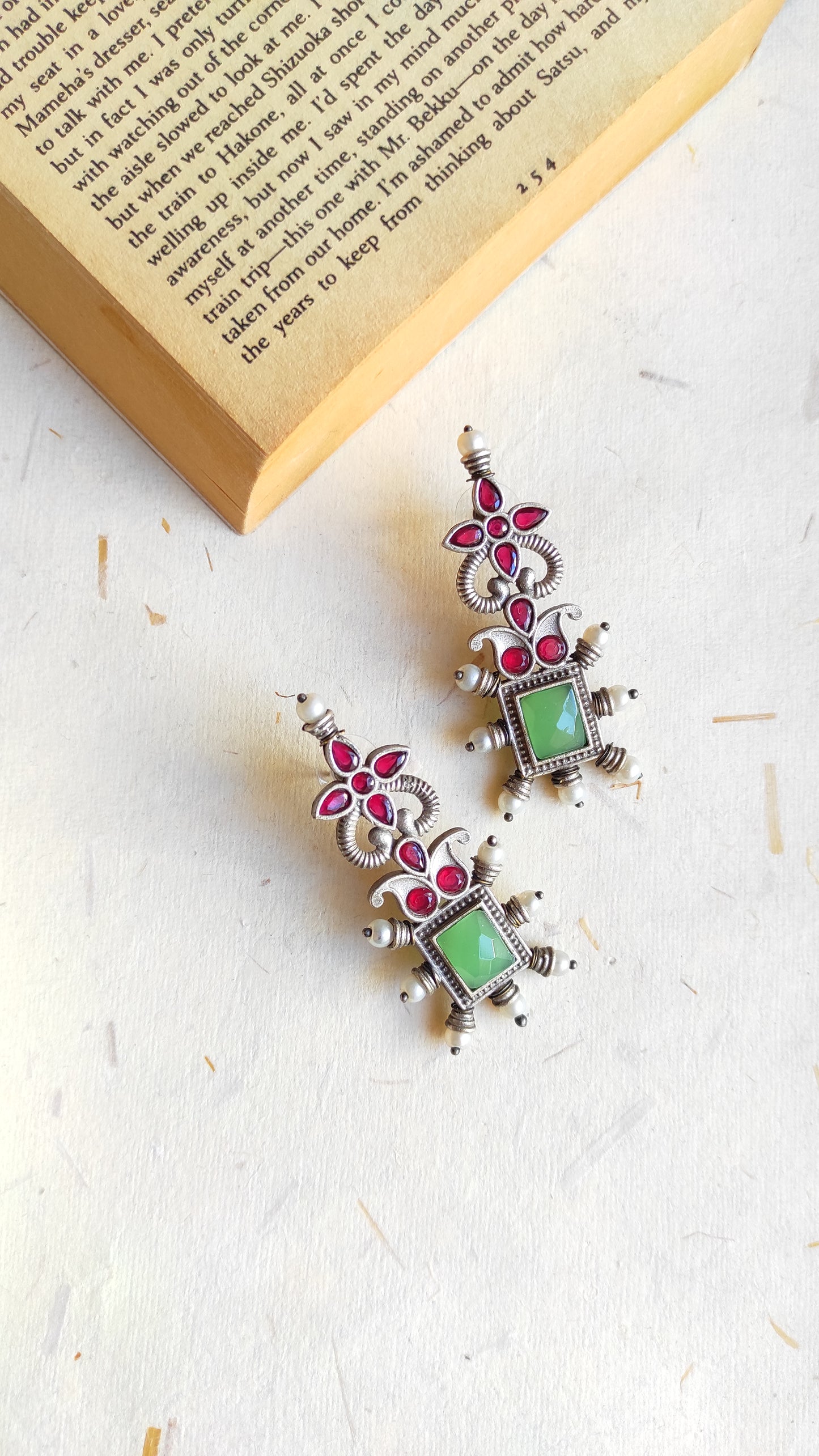 Sapna silver lookalike studs earrings