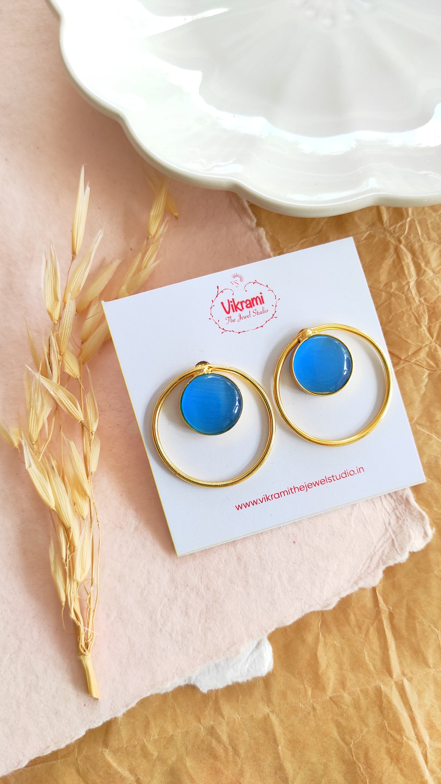 Golden contemporary studs earrings