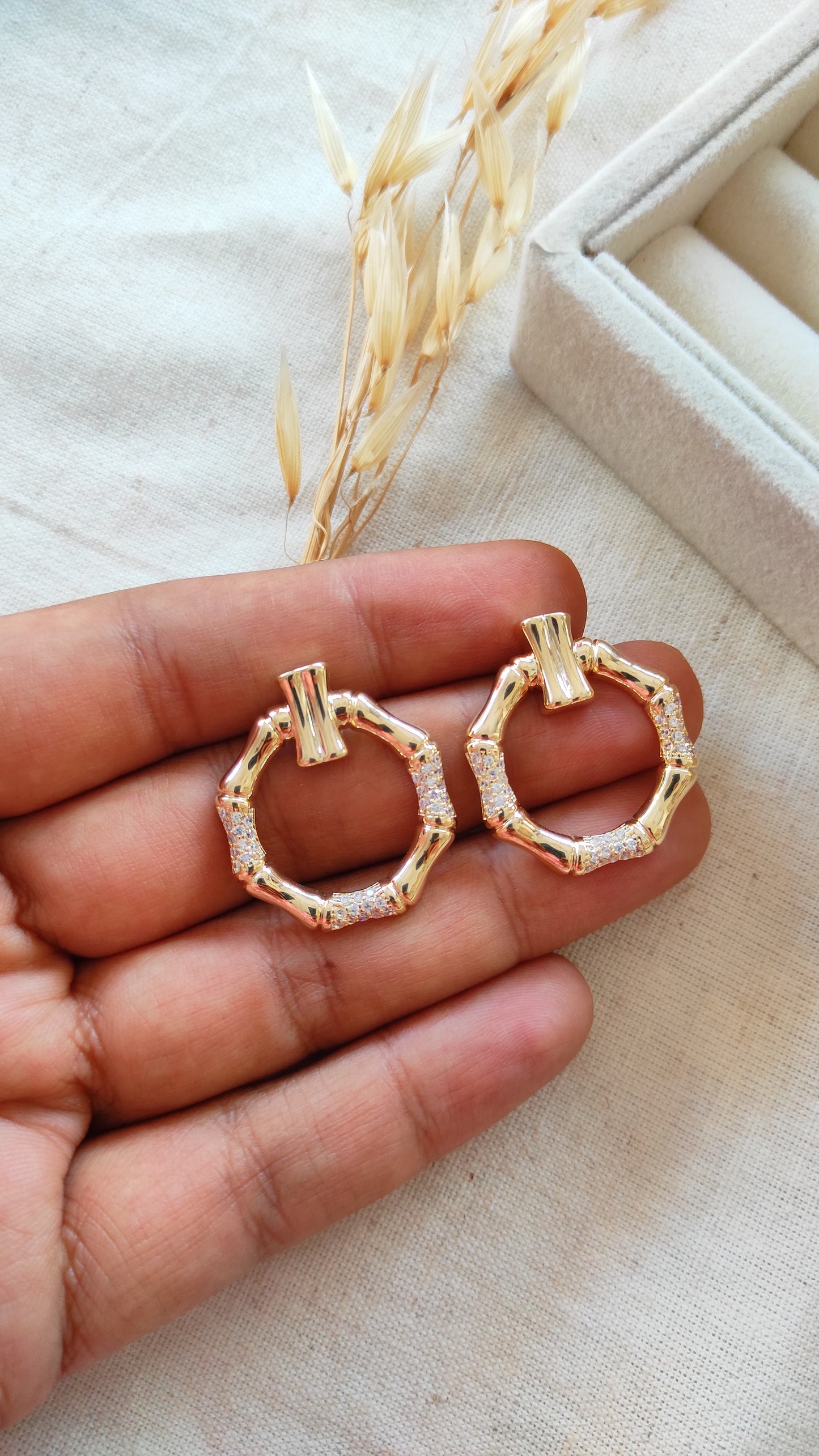 Golden loop studs earrings
