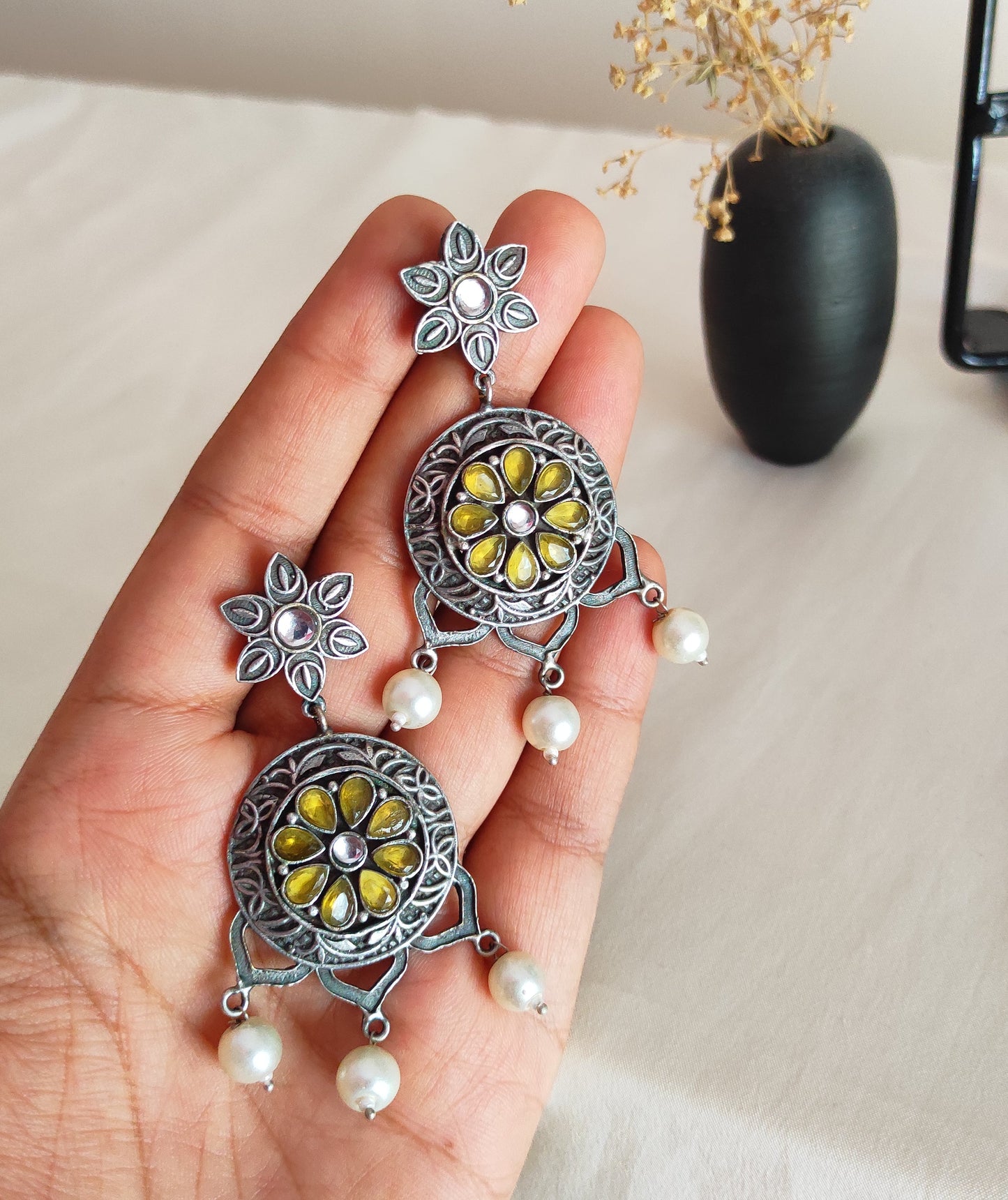 Netra silver lookalike earrings