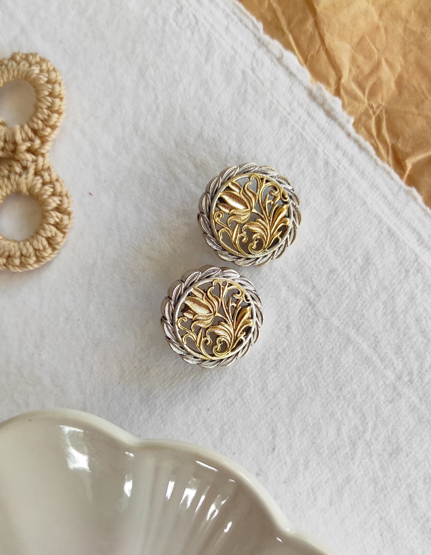 Nanda dual tone studs earrings