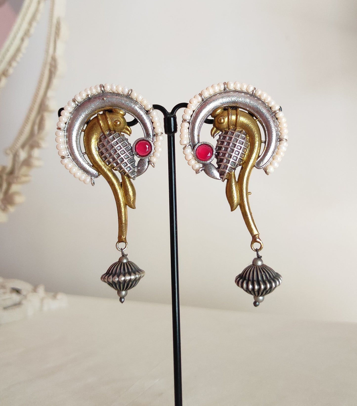 Maina dualtone studs earrings