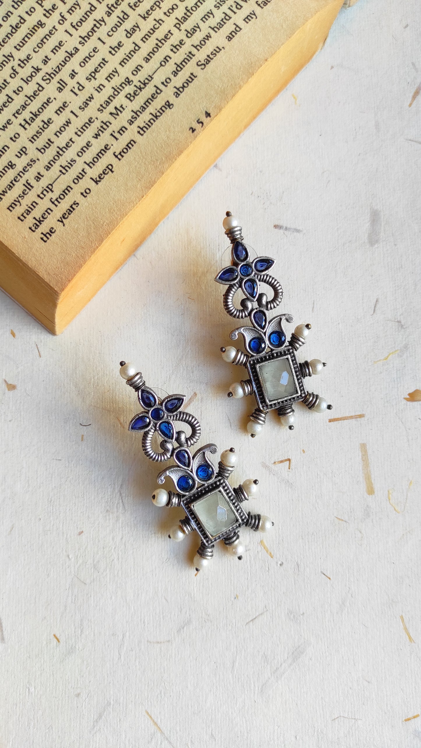 Sapna silver lookalike studs earrings