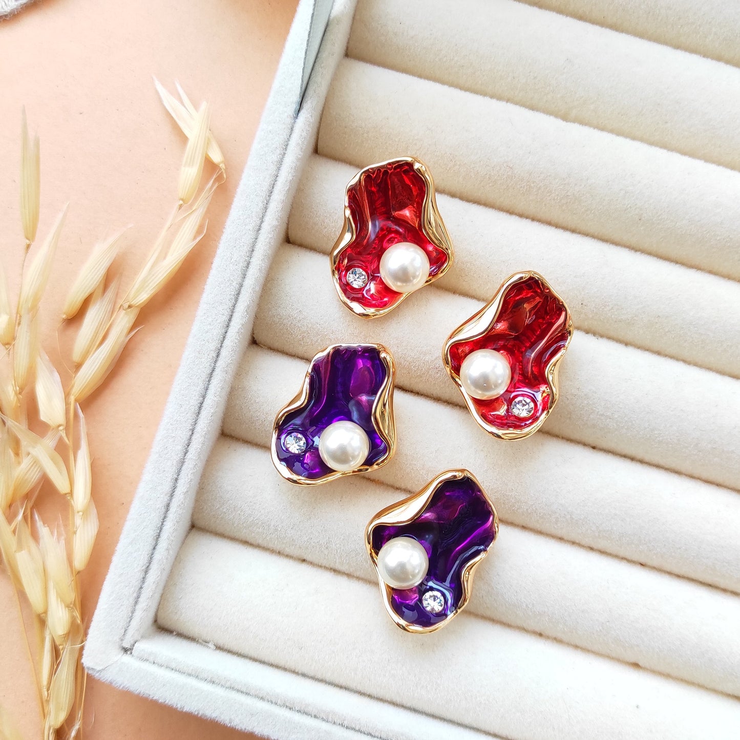 Golden enameled shell studs earrings