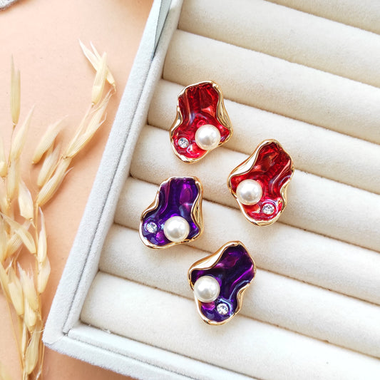 Golden enameled shell studs earrings