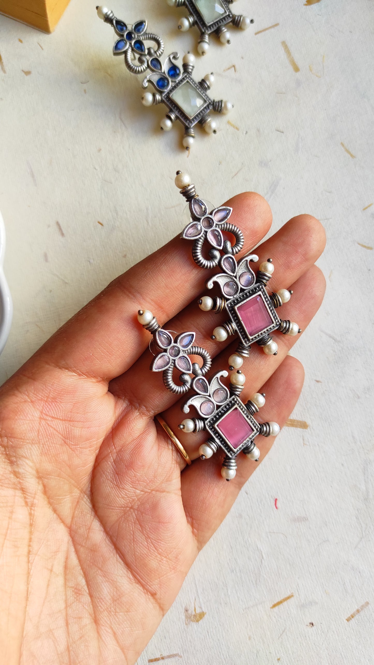 Sapna silver lookalike studs earrings