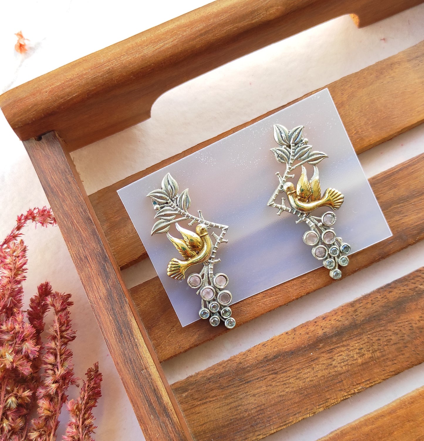 Parinda dualtone studs earrings