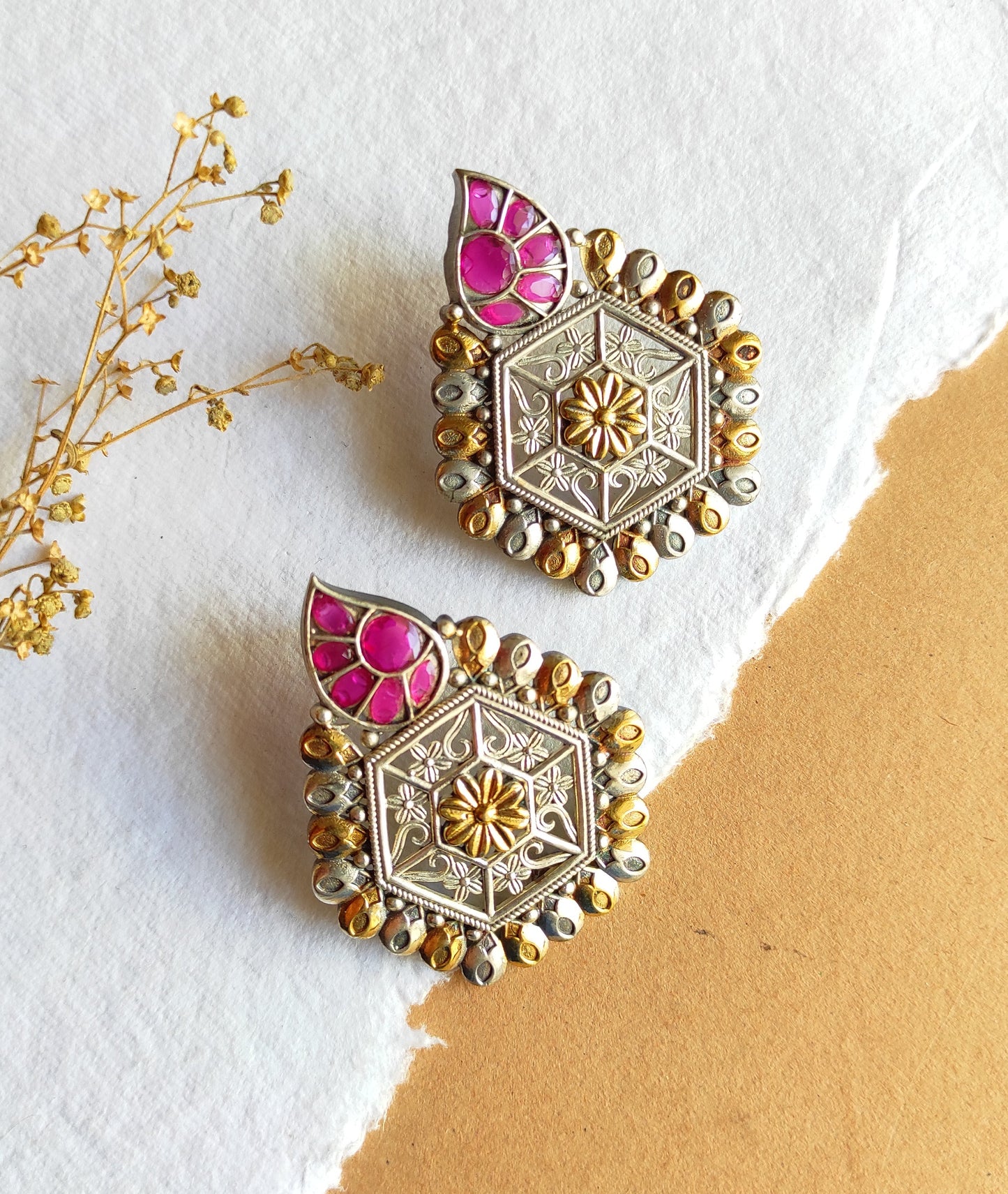 Hexagonal dualtone studs earrings with premium glass stones