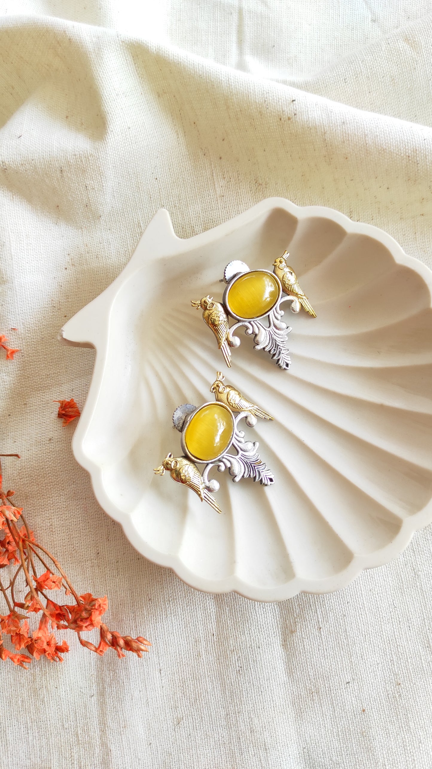 Chirpy bird dual tone studs earrings