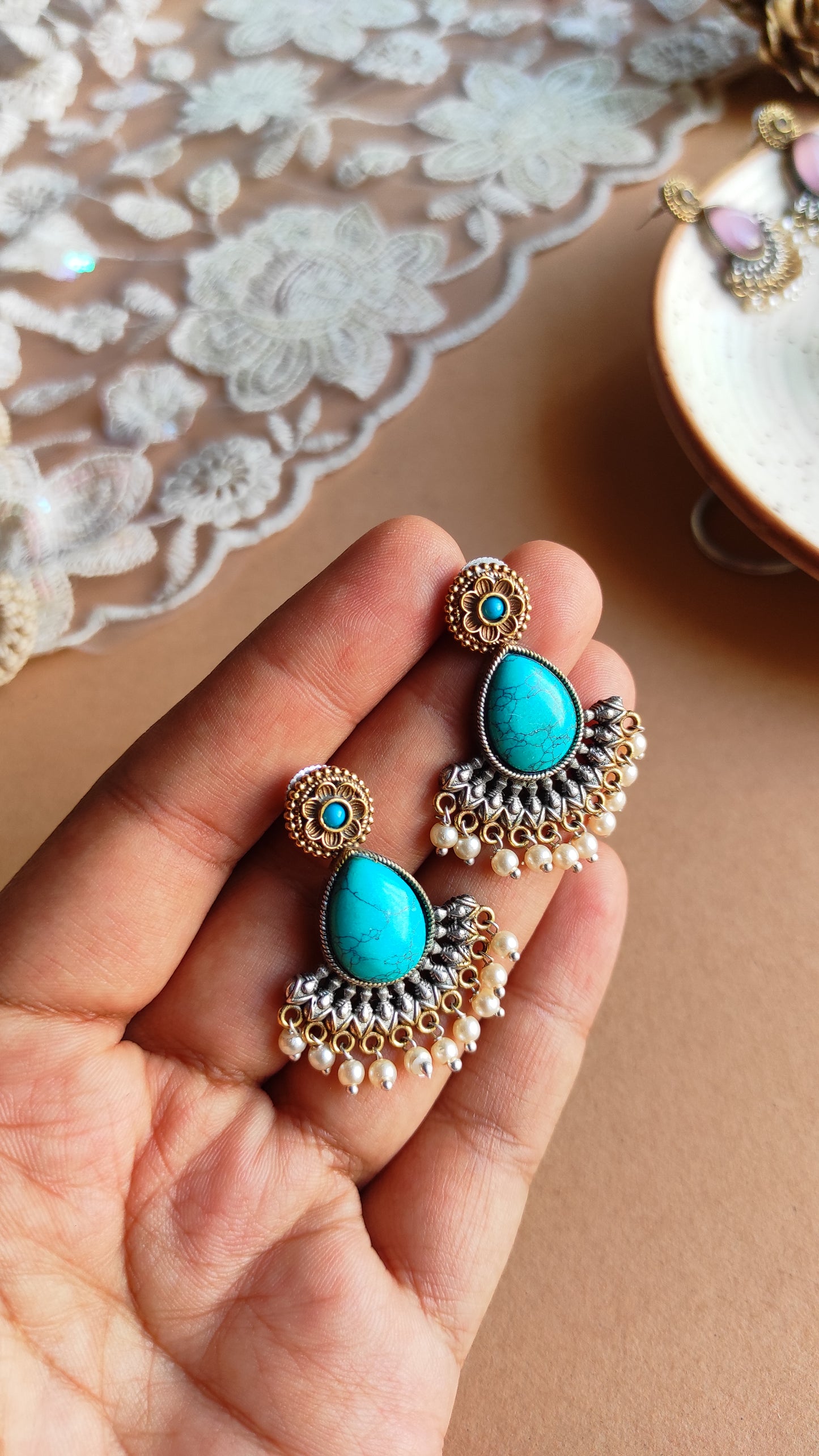Vrushali drop studs earrings