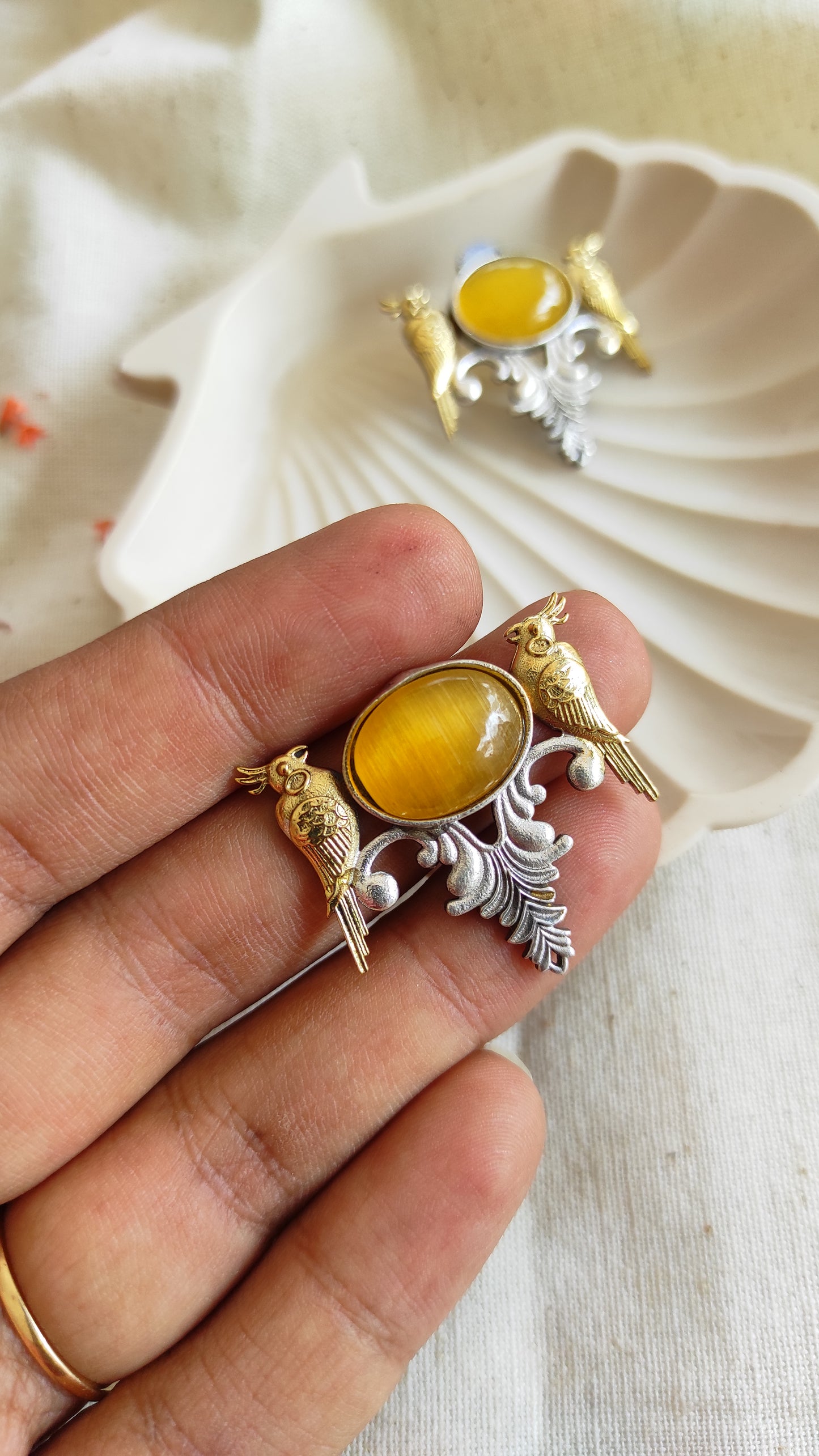 Chirpy bird dual tone studs earrings